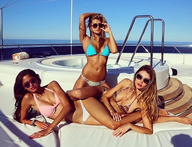 girls on a boat deck